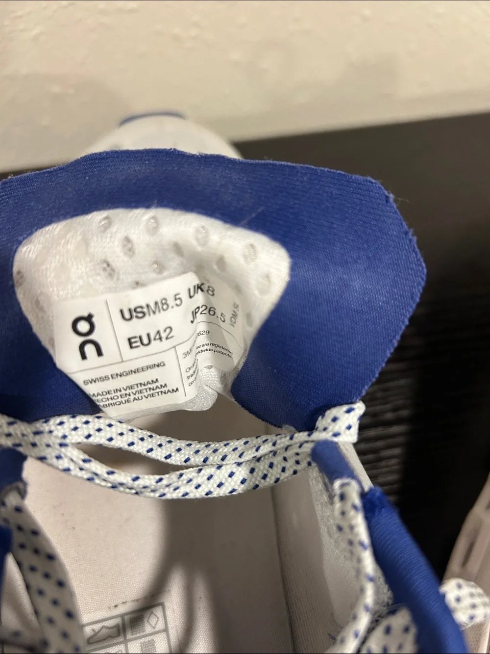 On Running White and Blue Cloudmonster Sneakers